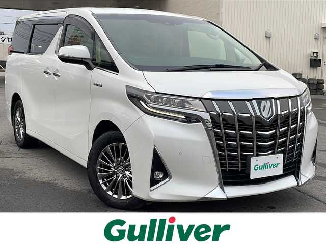 トヨタ アルファードハイブリット エグゼクティブ ラウンジ 道北・旭川 2019(令1)年 5.7万km ホワイトパールクリスタルシャイン /4WD//禁煙車//JBLサウンド//純正SDナビ//CD/DVD/BD/SD/MSV/BT/AUX/USB/フルセグ//パノラミックビューモニター//12.1型リアエンターテイメントシステム//ベージュ革シート//運転席メモリシート//パワーシート//１・2列目シートヒーター//１・2列目エアシート//両側パワースライドドア//パワーバックドア//トヨタセーフティセンス//PCS/ACC/LTA/BSM/RCTA/PKSB/RSA//クリアランスソナー//デジタルインナーミラー//１５００Wコンセント//ステアリングヒーター//純正ドライブレコーダー//ビルトインETC2.0//オートハイビーム//オートライト//3眼LEDヘッドライト//フォグライト//オートリトラミラー//オートワイパー//サンシェード//純正フロアマット//ドアバイザー
