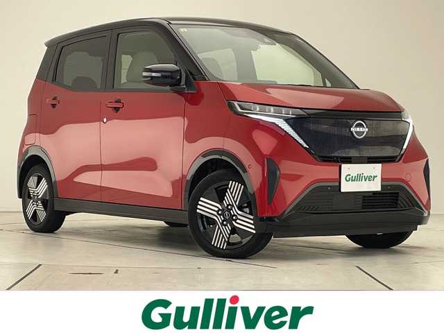 日産 サクラ G 愛知県 2023(令5)年 2.2万km スパークリングレッド/ブラック 純正9型ディスプレイオーディオナビ/全方位カメラ/プロパイロット/レーダークルーズコントロール/シートヒーター/バックカメラ/コーナーセンサー/純正アルミホイール/ETC2.0/インテリジェントミラー/LEDヘッドライト/ステアリングヒーター/レーンキープアシスト/オートマチックハイビーム/ドライブレコーダー/ステアリングスイッチ/スマートキー/プッシュスタート