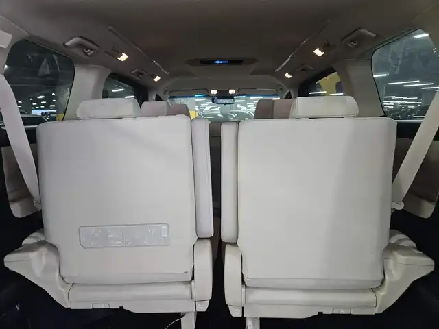 トヨタ ヴェルファイア ハイブリット X 福岡県 2018(平30)年 7.8万km ホワイトパールクリスタルシャイン 4WD/純正10型ナビ/フルセグTV/両側パワースライドドア/バックカメラ/ビルトインETC2.0/デジタルインナーミラー/ドライブレコーダー/レーダークルーズコントロール/クリアランスソナー/セーフティセンス/・衝突被害軽減ブレーキ/・車線逸脱防止支援システム/・交通標識認識システム/・オートマチックハイビーム/2眼LEDヘッドランプ/デュアルオートエアコン/革巻きステアリング/ベージュファブリックシート/2列目チップアップシート/純正16インチAWスタッドレス/スマートキー/プッシュエンジンスタート/禁煙車