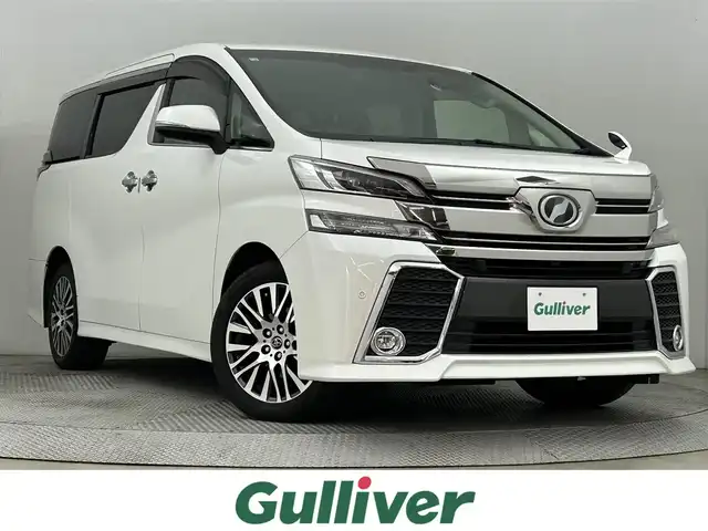 トヨタ ヴェルファイア Z Gエディション 道央・札幌 2016(平28)年 5.6万km ホワイトパールクリスタルシャイン ・ワンオーナー/・４WD/・純正10インチナビ/　CD/DVD/SD/BT/フルセグ/・純正フリップダウンモニター/・バックカメラ/・ビルトインETC/・100V電源/・プリクラッシュセーフティ/・レーダークルーズコントロール/・nanoe/・アイドリングストップ/・ハーフレザーシート/・パワーシート/・両側パワースライドドア/・パワーバックドア/・ステアリングヒーター/・LEDヘッドライト/・フォグライト/・オートライト/・プッシュスタート/・スマートキー/・純正フロアマット/・ドアバイザー