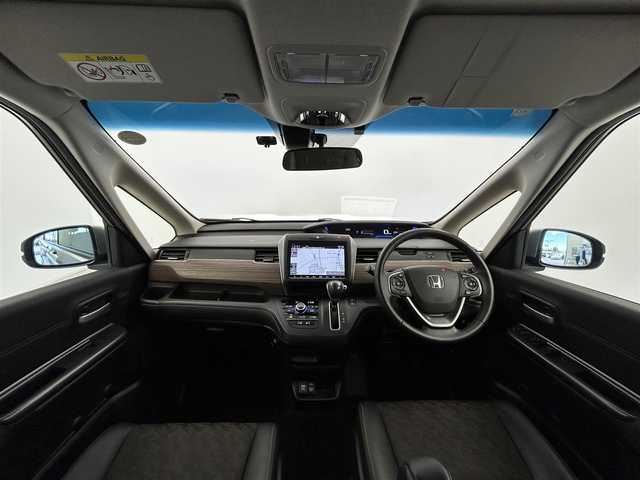 ホンダ フリード クロスター ホンダセンシング 愛知県 2021(令3)年 3.5万km スーパープラチナグレーメタリック ホンダセンシング/　　・衝突軽減ブレーキシステム/　　・歩行者事故低減ステアリング/　　・路外逸脱抑制機能/　　・アダプティブクルーズコントロール/　　・車線維持支援システム/　　・誤発信抑制機能/　　・先行車発進お知らせ機能/　　・標識認識機能/純正9インチインターナビ/　　・CD/DVD/フルセグ/Bluetooth/両側パワースライドドア/寒冷地仕様/ワイパーデアイサー/バックカメラ/ETC/本革巻ステアリングリモコン/ハーフレザーシート/シートヒーター（前席）/キャプテンシート/ロールサンシェード/純正LEDヘッドライト/フォグランプ/純正15インチアルミホイール/取扱説明書/保証書/スペアキー