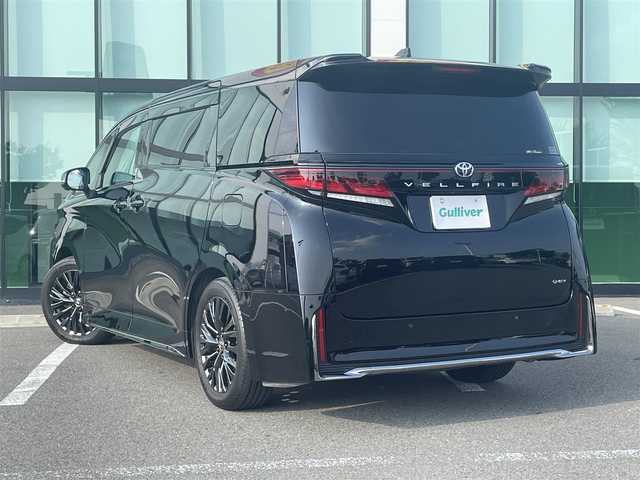 トヨタ ヴェルファイア ハイブリット Z プレミア 和歌山県 2024(令6)年 2.4万km ブラック 純正14インチナビ/フルセグTV/Bluetooth/全周囲カメラ/ETC2.0/ALPINEデジタルインナーミラー型ドラレコ/トヨタセーフティセンス/BSM/PCS/LTA/LDA/RSA/FCTA/LCA/PDA/TMN/緊急時操舵支援/レーダークルーズコントロール/トヨタチームメイト/アドバンストパーク/アドバンストドライブ/純正12.1インチフリップダウンモニター/カラーHUD/左右独立ムーンルーフ/両側パワースライドドア/電動リアゲート/置くだけ充電/レザーシート黒/前席パワーシート/前席シートヒーター/前席シートベンチレーション/2列目エグゼクティブパワーシート/電動パーキングブレーキ/オートブレーキホールド/革巻きステアリング/パドルシフト/ステアリングスイッチ/リアドアサンシェード/LEDヘッドライト/フォグランプ/オートライト/アダプティブハイビームシステム/純正19インチAW/ドアバイザー/プッシュスタート/スマートキー/取扱説明書/保証書