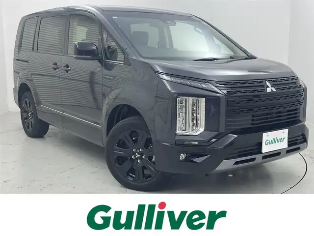 三菱 デリカＤ：５ シャモニー 茨城県 2025(令7)年 0.1千km グラファイトグレーメタリック/ブラックマイカ CHAMONIX (8人)/4WD　e-Assist/電動ステップレス/D:5専用11型ナビゲーション/・フルセグＴＶ/・ＣＤ/・ＤＶＤ/・Bluetooth/全周囲モニター/12.8型後席用モニター/衝突被害軽減ブレーキ/追従型クルーズコントロール/両側パワースライドドア/パワーシート/レザーシート/シートヒーター/ステアリングヒーター/電動リヤゲート/プッシュスタート/スマートキー/スペアキー