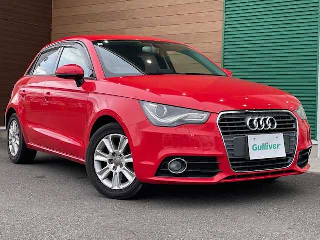 アウディ Ａ１ スポーツバック 1．4TFSI 静岡県 2014(平26)年 4.3万km 赤 純正ナビ/（AM/FM/ワンセグTV/Bluetooth/CD）/MTモード付AT/純正15inAW/キセノンヘッドライト/ETC/横滑り防止機能/オートライト/電動格納ミラー/ステアリングスイッチ/純正フロアマット/スマートキー/プッシュスタート/スペアキー1/保証証/取扱説明書