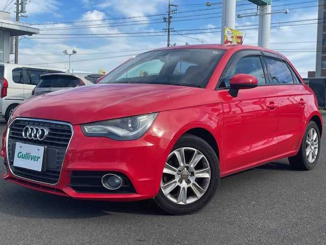 アウディ Ａ１ スポーツバック 1．4TFSI 静岡県 2014(平26)年 4.3万km 赤 純正ナビ/（AM/FM/ワンセグTV/Bluetooth/CD）/MTモード付AT/純正15inAW/キセノンヘッドライト/ETC/横滑り防止機能/オートライト/電動格納ミラー/ステアリングスイッチ/純正フロアマット/スマートキー/プッシュスタート/スペアキー1/保証証/取扱説明書