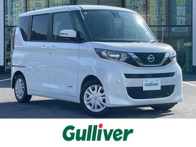 日産 ルークス X 岡山県 2022(令4)年 3.3万km ホワイトパール 登録時走行距離32988km/社外ナビ(MDV-D208BT)/　(CD/DVD/フルセグTV/Bluetooth)/全方位カメラ/コーナーセンサー/両側スライドドア/パワースライドドア/Clazzioレザー調シートカバー/ステアリングスイッチ/オートライト/ヘッドライトレベライザー/プッシュスタート/スマートキー/スペアキー×1/アイドリングストップ/ロールサンシェード/電動格納ミラー/純正フロアマット/横滑防止装置/盗難防止装置/取扱説明書/新車時整備手帳（保証書）