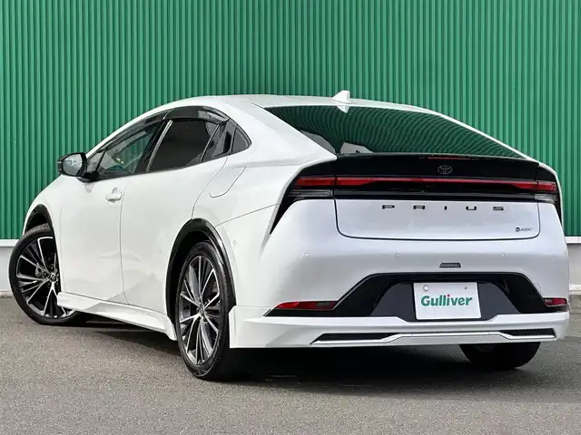 トヨタ プリウス Z 宮城県 2023(令5)年 3.8万km プラチナホワイトパールマイカ 寒冷地仕様/＝＝＝/モデリスタエアロ（F/S/R）/セーフティセンス/・プリクラッシュセーフティ/・緊急時操舵支援/・フロントクロストラフィックアラート/・レーンチェンジアシスト/・レーントレーシングアシスト/・レーンディパーチャーアラート/・レーダークルーズコントロール/・オートマチックハイビーム/・ロードサインアシスト/・ドライバー異常時対応システム/・プロアクティブドライビングアシスト/・発進遅れ告知機能/BSM/安心降車アシスト/後方車両接近通知/周辺車両接近時サポート/後方車両への接近警報/セカンダリーコリジョンブレーキ/トヨタチームメイト（アドバストパーク）/パーキングサポートブレーキ/パノラミックビューモニター/12.3インチディスプレイオーディオ/・コネクティッドナビ/・地デジTV/・USB/・AppleCarPlay/AndroidAuto/ビルトインETC2.0/AC100V/1500W/ワイヤレス充電器/本革シート/シートヒーター/ベンチレーション/ステアリングヒーター/運転席メモリー機能付パワーシート