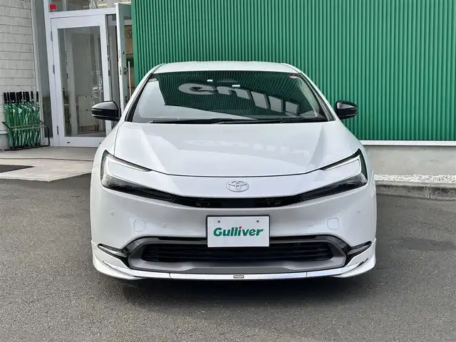 トヨタ プリウス Z 宮城県 2023(令5)年 3.8万km プラチナホワイトパールマイカ 寒冷地仕様/＝＝＝/モデリスタエアロ（F/S/R）/セーフティセンス/・プリクラッシュセーフティ/・緊急時操舵支援/・フロントクロストラフィックアラート/・レーンチェンジアシスト/・レーントレーシングアシスト/・レーンディパーチャーアラート/・レーダークルーズコントロール/・オートマチックハイビーム/・ロードサインアシスト/・ドライバー異常時対応システム/・プロアクティブドライビングアシスト/・発進遅れ告知機能/BSM/安心降車アシスト/後方車両接近通知/周辺車両接近時サポート/後方車両への接近警報/セカンダリーコリジョンブレーキ/トヨタチームメイト（アドバストパーク）/パーキングサポートブレーキ/パノラミックビューモニター/12.3インチディスプレイオーディオ/・コネクティッドナビ/・地デジTV/・USB/・AppleCarPlay/AndroidAuto/ビルトインETC2.0/AC100V/1500W/ワイヤレス充電器/本革シート/シートヒーター/ベンチレーション/ステアリングヒーター/運転席メモリー機能付パワーシート