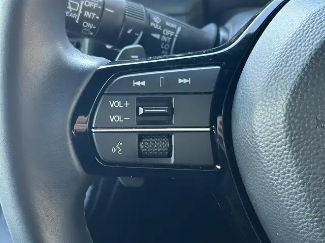 ホンダ ステップワゴン スパーダ eHEV プレミアムライン 佐賀県 2023(令5)年 3.4万km プラチナホワイトパール ワンオーナー/純正11.4型ナビ/・マルチビューカメラ/・フルセグTV/BT/CD/DVD/HDMI/純正15.6型後席モニター(VM-231FE)/純正前後ドライブレコーダー(DRH-229ND)/ホンダセンシング/・衝突軽減ブレーキ（CMBS）/・誤発進抑制機能/・後方誤発進抑制機能/・近距離衝突軽減ブレーキ/・歩行者事故低減ステアリング/・路外逸脱抑制機能/・渋滞追従機能付アダプティブクルーズコントロール（ACC）/・車線維持支援システム（LKAS）/・トラフィックジャムアシスト（渋滞運転支援機能）/・オートハイビーム/・アダプティブドライビングビーム/前後パーキングセンサー/ブラインドスポットインフォメーション/ハーフレザーシート　/1.2列目シートヒーター/2列目オットマン/パワーテールゲート　/純正17インチAW/両側パワースライドドア/LEDヘッドライト/革巻きステアリング/パドルシフト/スペアキー×1/取扱説明書/保証書