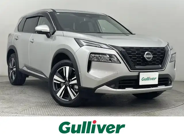 日産 エクストレイル G e－4ORCE 道央・札幌 2022(令4)年 0.5万km ブリリアントシルバー ・４WD/・ワンオーナー/・日産コネクトナビ/　USB/Bluetooth/AppleCarPlay/・アラウンドビューモニター/・デジタルインナーミラー/・ビルトインETC2.0/・ワイヤレス充電/・ヘッドアップディスプレイ/・プロパイロット/　衝突被害軽減ブレーキ/　レーンキープアシスト/　後側方車両検知警報/　衝突防止支援/　踏み間違い衝突防止/　ロードサインアシスト/・パーキングサポート/・レーダークルーズコントロール/・クリアランスソナー/・ダウンヒルアシストコントロール/・横滑り防止装置/・ABS/・オートブレーキホールド/・オートマチックハイビーム/・LEDヘッドライト/・フロントフォグランプ/・レザーシート/・D+N席シートヒーター/・社外フロアマット/・プッシュスタート/・スマートキー/・スペアキー/・取/保