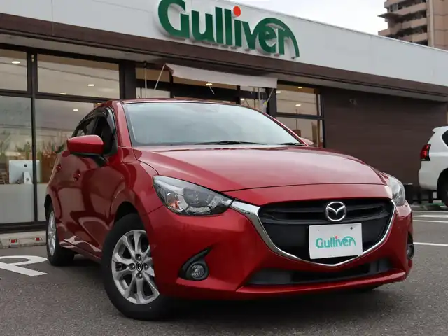 マツダ デミオ 13S 福島県 2015(平27)年 13.8万km ソウルレッドプレミアムメタリック  ワンオーナー / 純正ナビ・フルセグTV/ スマートキー/ 衝突被害軽減ブレーキ/ 純正アルミホイル/ 純正フォグランプ/ 横滑り防止装置/ アイドリングストップ