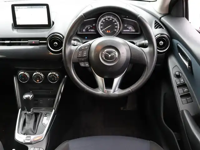 マツダ デミオ 13S 福島県 2015(平27)年 13.8万km ソウルレッドプレミアムメタリック  ワンオーナー / 純正ナビ・フルセグTV/ スマートキー/ 衝突被害軽減ブレーキ/ 純正アルミホイル/ 純正フォグランプ/ 横滑り防止装置/ アイドリングストップ