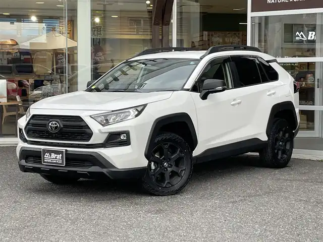 トヨタ ＲＡＶ４ アドベンチャー オフロードPKGⅡ 福島県 2022(令4)年 0.6万km スーパーホワイトⅡ ワンオーナー/追従機能付きクルーズコントロール/ハンズフリーパワーバックドア/デジタルインナーミラー/純正ナビ/　AM/FM/TV/Bluetooth/バックカメラ/全周囲モニター/純正アルミホイール/ETC２．０/ステアリングスイッチ/ステアリングヒーター/レザーシート/パワーシート（D席）/シートヒーター（前席）/シートベンチレーション（前席）/メモリーシート/電子制御パーキングブレーキ/ブレーキホールド/前後クリアランスソナー/レーダーブレーキサポート/LEDヘッドライト/フォグランプ/オートマチックハイビーム/オートライト/４WD/ダウンヒルアシストコントロール/MTモード付AT/衝突被害軽減システム/レーンキープアシスト/横滑り防止装置/盗難防止装置/ルーフレール/スペアキー（1本）/保証書/取扱説明書
