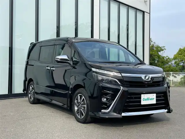 トヨタ ヴォクシー ZS 煌Ⅱ 大阪府 2019(平31)年 5.5万km イナズマスパーキングブラックガラスフレーク 純正８インチナビ/   フルセグTV/CD/DVD/Bluetooth/USB/衝突軽減/バックモニター/１２インチ後席モニター/スマートルームミラー/両側パワースライドドア/クルーズコントロール/前後ドライブレコーダー/ＥＴＣ/ＬＥＤライト/禁煙車