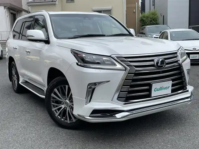 レクサス ＬＸ 570 神奈川県 2016(平28)年 6.2万km ホワイトパールクリスタルシャイン サンルーフ/オレンジ革シート/モデリスタエアロ/マフラー/純正20インチAW/クールBOX/ヘッドアップディスプレイ/レクサスセーフティシステム+/レーダークルーズコントロール/PCS/LDA/BSM/RCTA/コーナーセンサー/純正SDナビ・地デジTV/パノラマモニター/ビルトインETC2.0/前席パワーシート/シートヒーター/エアシート/ステアリングヒーター/パワーバックドア/LEDライト/LEDフォグライト/オートハイビーム/ルーフレール/ヒッチメンバー/パドルシフト/プッシュスタート/スマートキー×2/カードキー×1/H28/29/30/R1/2/4年ディーラー整備記録/保証書・取説あり