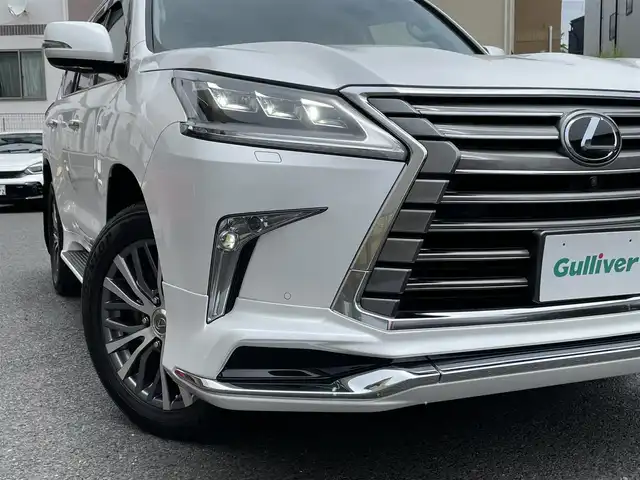 レクサス ＬＸ 570 神奈川県 2016(平28)年 6.2万km ホワイトパールクリスタルシャイン サンルーフ/オレンジ革シート/モデリスタエアロ/マフラー/純正20インチAW/クールBOX/ヘッドアップディスプレイ/レクサスセーフティシステム+/レーダークルーズコントロール/PCS/LDA/BSM/RCTA/コーナーセンサー/純正SDナビ・地デジTV/パノラマモニター/ビルトインETC2.0/前席パワーシート/シートヒーター/エアシート/ステアリングヒーター/パワーバックドア/LEDライト/LEDフォグライト/オートハイビーム/ルーフレール/ヒッチメンバー/パドルシフト/プッシュスタート/スマートキー×2/カードキー×1/H28/29/30/R1/2/4年ディーラー整備記録/保証書・取説あり