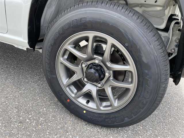 スズキ ジムニー XC 石川県 2025(令7)年 0.1万km未満 ピュアホワイトP 届出済未使用車/4WD/ターボ/スズキセーフティサポート/スマートキー/プッシュスタート/電動ミラー/純正アルミホイール/シートヒーター/フォグランプ/コーナーセンサー/保証書
