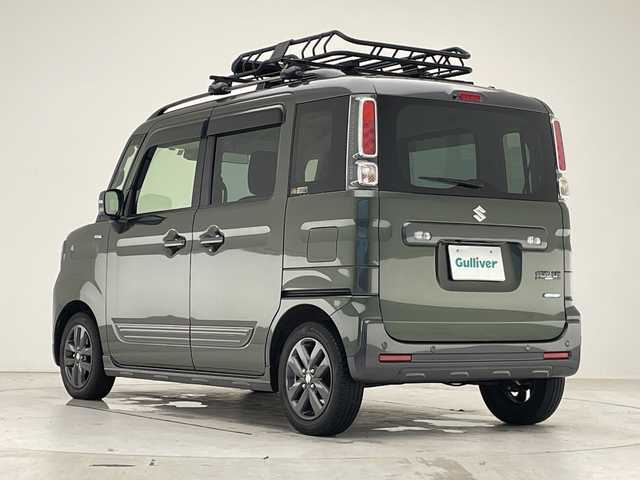 スズキ スペーシア ギア HYBRID XZターボ 愛知県 2023(令5)年 2.6万km クールカーキパールメタリック/ガンメタリック2トーン 純正8型ナビ　ＳＤカードなし/両側パワースライドドア/レーダークルーズコントロール/シートヒーター/バックカメラ/ヘッドアップディスプレイ/純正アルミホイール/コーナーセンサー/ルーフレール/LEDヘッドライト/パドルシフト/レーンキープアシスト/オートマチックハイビーム/ETC/衝突軽減システム/フルセグ/CD DVD/Bluetooth/ルーフキャリア/ステアリングスイッチ/スマートキー/プッシュスタート