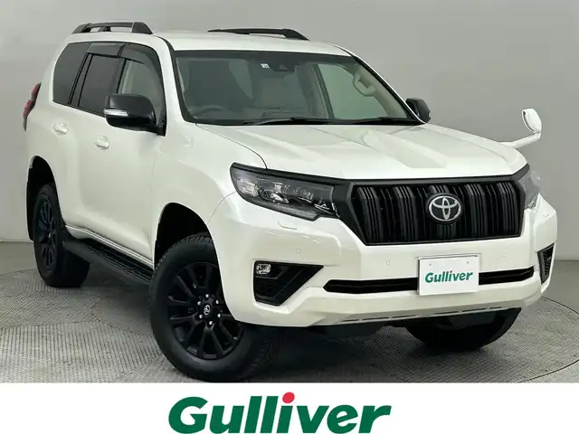 トヨタ ランドクルーザー プラド TX Lパッケージ マットブラED 道央・札幌 2022(令4)年 1.6万km ホワイトパールクリスタルシャイン ・ワンオーナー/・４WD/・メーカーナビ/　CD/DVD/SD/BT/フルセグ/・バックカメラ/・ビルトインETC/・トヨタセーフティセンス/・レーダークルーズコントロール/・クリアランスソナー/・オートハイビーム/・PCS/・RSA/・レザーシート/・前席パワーシート/・前席シートヒーター/・前席シートベンチレーション/・プッシュスタート/・スマートキー/・LEDヘッドライト/・フォグライト/・オートライト/・純正フロアマット/・ドアバイザー