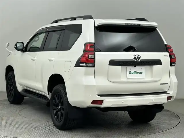 トヨタ ランドクルーザー プラド TX Lパッケージ マットブラED 道央・札幌 2022(令4)年 1.6万km ホワイトパールクリスタルシャイン ・ワンオーナー/・４WD/・メーカーナビ/　CD/DVD/SD/BT/フルセグ/・バックカメラ/・ビルトインETC/・トヨタセーフティセンス/・レーダークルーズコントロール/・クリアランスソナー/・オートハイビーム/・PCS/・RSA/・レザーシート/・前席パワーシート/・前席シートヒーター/・前席シートベンチレーション/・プッシュスタート/・スマートキー/・LEDヘッドライト/・フォグライト/・オートライト/・純正フロアマット/・ドアバイザー