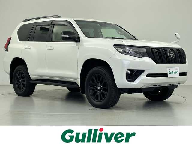 トヨタ ランドクルーザー プラド TX Lパッケージ マットブラED 愛知県 2022(令4)年 1.6万km ホワイトパールクリスタルシャイン ４WD/純正メーカーナビ/・CD/DVD/SD/BT/フルセグ/バックカメラ/ビルトインETC/トヨタセーフティセンス/レーダークルーズコントロール/クリアランスソナー/オートハイビーム/レザーシート/前席パワーシート/前席シートヒーター/前席シートベンチレーション/プッシュスタート/スマートキー/スペアキー１本/LEDヘッドライト/フォグライト/オートライト/純正フロアマット/ドアバイザー