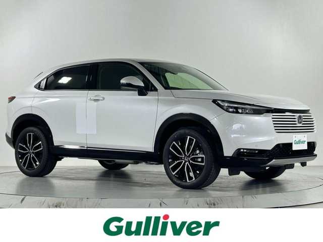 ホンダ ヴェゼル ハイブリッド e:HEV Z 佐賀県 2025(令7)年 0.1千km プラチナホワイトパール 純正ナビ　/フルセグテレビ/アップルカープレイ・アンドロイドオート/衝突被害軽減装置　/追従型クルーズコントロール　/ブラインドスポットモニター　/置くだけ充電　/シートヒーター　/ハンドルヒーター　/バックカメラ　/レーンキープアシスト　/スペアキー　/ＥＴＣ２．０/コーナーセンサー/パドルシフト/純正アルミホイール/ダウンヒルアシストコントロール/チップアップシート