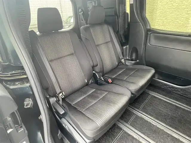 トヨタ ヴォクシー ハイブリッド ZS 煌Ⅱ 大阪府 2019(令1)年 4.5万km ブラッキッシュアゲハガラスフレーク T-Connect１０インチナビ（NSZN-Z68T）/純正12.1インチフリップダウンモニター（V12T-R68C)/クルーズコントロール/バックモニター/両側パワースライドドア/前後コーナーセンサー/衝突軽減システム/レーンキープアシスト/前席シートヒーター/後席サンシェード/純正ドライブレコーダー/純正ＥＴＣ/純正16インチAW/保証書/取り扱い説明書/スペアキーX1