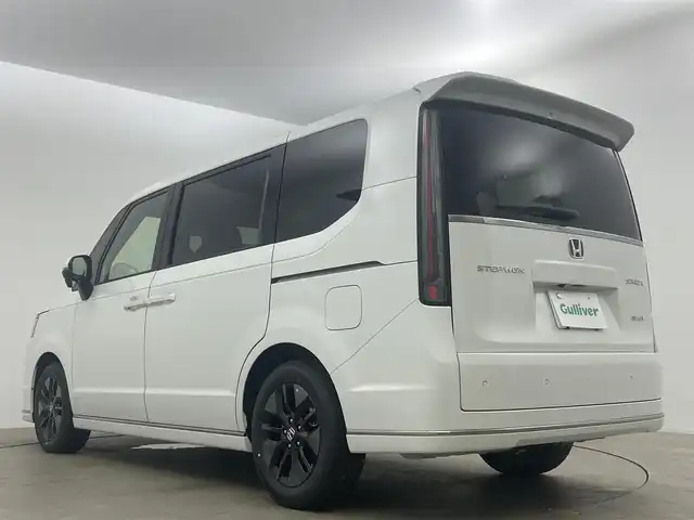 ホンダ ステップワゴン スパーダ eHEV 岡山県 2025(令7)年 0.1万km未満 プラチナホワイトパール 登録済未使用車	/純正11.4インチメモリナビゲーション		/【フルセグ/Bluetooth/DVD/MSV/MSP】		/バックカメラ/純正16inアルミホイール+サマータイヤ：装着			/フロント・サイド・リアエアロパーツ		/レーダークルーズコントロール			/LEDヘッドライト（AUTO機能付き）		/シートヒーター		/横滑り防止機能		/衝突軽減システム		/車線逸脱防止システム				/スマートキー		/ステアリングスイッチ		/プッシュスタート		/コーナーセンサー				/新車保証書		/取扱説明書		/スペアキー×１