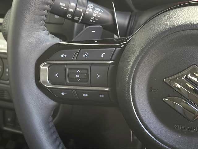 スズキ スペーシア カスタム HYBRID XS ターボ 山口県 2024(令6)年 0.5万km ピュアホワイトP 社外8インチナビ【AVIC-RL99】/・フルセグテレビ/・Bluetooth/・CD／DVD/両側パワースライドドア/ETC/ワンオーナー/レーダークルーズコントロール/シートヒーター【D＋N席】/USB充電口/タイプC充電口/ステアリングスイッチ/ステアリングホールド/ステアリングヒーター/パドルシフト/フルフラットシート/オットマン/助手席シートアンダーボックス/スズキセーフティサポート/・デュアルセンサーブレーキサポートII/・誤発信抑制機能/・後方誤発信抑制機能/・低速時ブレーキサポート（前進・後退）/・パーキングセンサー（フロント・リア）/・車線逸脱警報機能/・車線逸脱抑制機能/・ふらつき警報機能/・発進お知らせ機能/・標識認識機能/・ヘッドアップディスプレイ/・車線維持支援機能