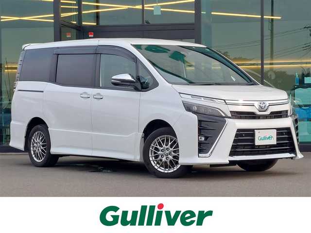 トヨタ ヴォクシー ハイブリッド ZS 煌Ⅲ 東京都 2020(令2)年 3.4万km ホワイトパールクリスタルシャイン ワンオーナー/純正ナビ/Bluetooth/両側パワースライドドア/ETC/プッシュスタート/前席シートヒーター/ドライブレコーダー/バックカメラ/コーナーセンサー/衝突軽減ブレーキ/純正アルミホイール/純正フロアマット/クルーズコントロール/新車保証書/取扱説明書/キーレスエントリー