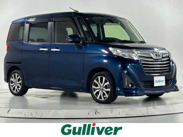トヨタ ルーミー カスタムG－T 佐賀県 2018(平30)年 8.6万km レーザーブルークリスタルシャイン ワンオーナー/衝突軽減ブレーキ/純正9インチナビ/CD/DVD/フルセグTV/Bluetooth/全方位カメラ/ビルトインETC/クルーズコントロール/前方ドライブレコーダー/コーナーセンサー /純正フロアマット/純正15インチアルミホイール/LEDライト/フォグライト /オートライト/オートマチックハイビーム/スマートキー/スペアキー/電動格納ミラー/横滑り防止装置