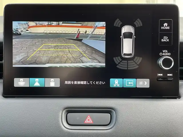 ホンダ ヴェゼル ハイブリッド e:HEV Z 大阪府 2025(令7)年 0.1千km プラチナホワイトパール ホンダセンシング/　・衝突軽減ブレーキ　CMBS/　・先行車発進お知らせ機能/　・アダプティブクルーズコントロール　ACC/　・車線維持支援システム　LKAS/　・トラフィックジャムアシスト/　・ブラインドスポットフォーメーション/　・誤発進抑制機能/　・後方お発進抑制機能/　・パーキングセンサーシステム/　・オートハイビーム/純正ディーラーOPナビ/　Bluetooth/フルセグ/FM/バックカメラ/パワーバックドア/LEDオートライト/フォグランプ/ハーフレザーシート/シートヒーター/ワイヤレス充電器/スマートキー/ビルトインETC/ステアリングスイッチ