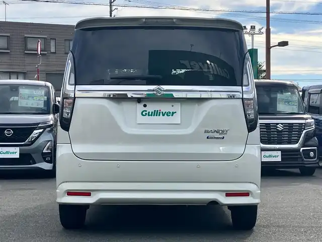 スズキ ソリオ バンディット HV MV 静岡県 2022(令4)年 3.4万km ピュアホワイトP SDナビ(CD/DVD/BT/フルセグ)/バックカメラ/レーダークルーズコントロール/ドライブレコーダー前後/ETC/エンジンスタートボタン/パワーウィンドウ/パワーステアリング/アイドリングストップ/スマートキー/オートエアコン/USB入力端子/ウォークスルー/純正フロアマット/布シート/D席N席シートヒーター/左側パワースライドドア/右側スライドドア/純正アルミホイール/ABS/横滑り防止装置/コーナーセンサー/レーンキープアシスト/盗難防止装置/オートライト/オートマチックハイビーム/LEDヘッドライト/W+サイドエアバック/衝突軽減システム/ヘッドアップディスプレイ