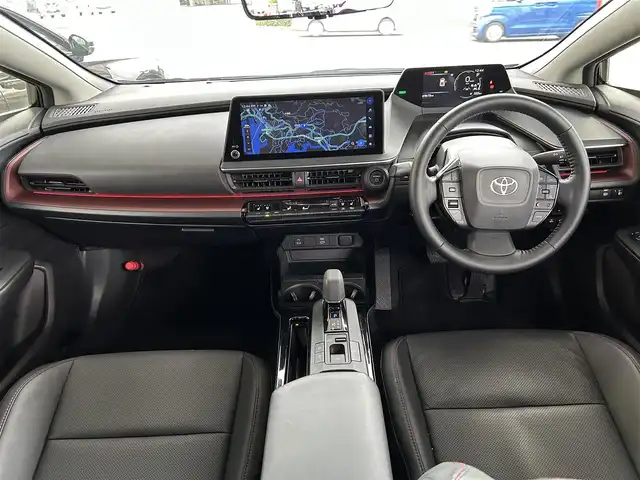 トヨタ プリウス Z 長崎県 2024(令6)年 7万km アティチュードブラックマイカ プッシュスタート/純正ナビ付ディスプレイオーディオ（AM/FM/BT/TV)/クルーズコントロール/オートライト/オートハイビーム/ハンドルヒーター/シートヒーター（D/N)/エアシート（D/N)/パワーバックドア/ETC2.0/電子サイドブレーキ/ブレーキホールド/バックカメラ/全方位カメラ/トヨタセーフティセンス/横滑り防止装置/レーンキープアシスト/充電Cタイプ/AC100V/デジタルインナーミラー