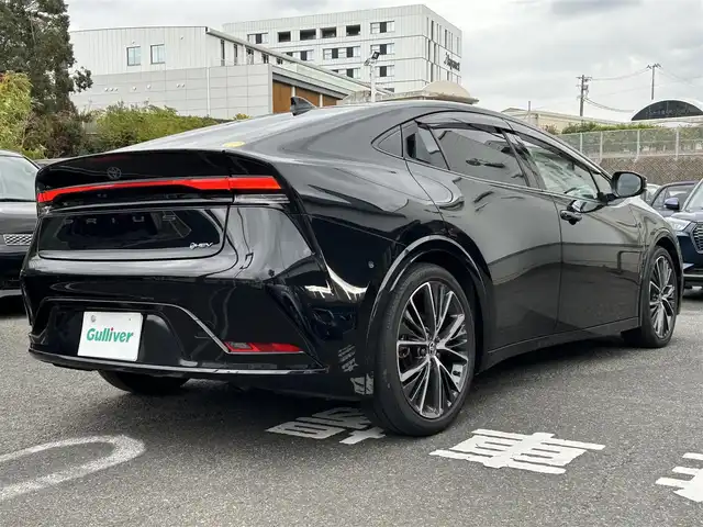 トヨタ プリウス Z 長崎県 2024(令6)年 7万km アティチュードブラックマイカ プッシュスタート/純正ナビ付ディスプレイオーディオ（AM/FM/BT/TV)/クルーズコントロール/オートライト/オートハイビーム/ハンドルヒーター/シートヒーター（D/N)/エアシート（D/N)/パワーバックドア/ETC2.0/電子サイドブレーキ/ブレーキホールド/バックカメラ/全方位カメラ/トヨタセーフティセンス/横滑り防止装置/レーンキープアシスト/充電Cタイプ/AC100V/デジタルインナーミラー