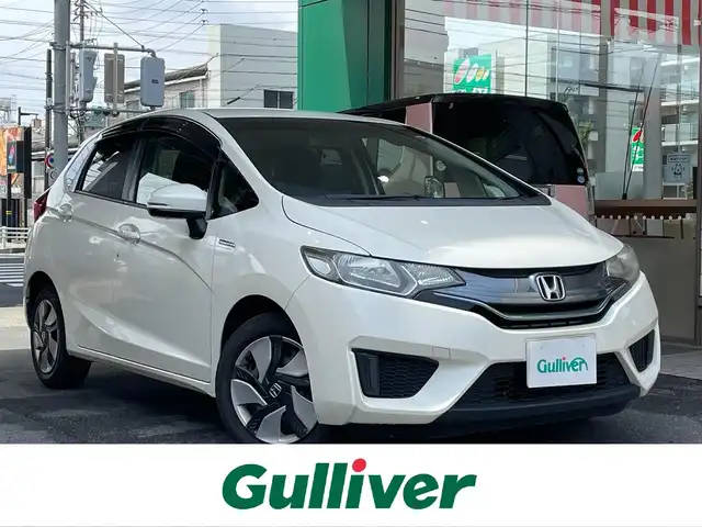 ホンダ フィット ハイブリット Fパッケージ 愛知県 2014(平26)年 18.8万km プレミアムホワイトパール ワンオーナー/純正ナビ（vxm-145vsi）/・DVD/Bluetooth／ワンセグTV/バックカメラ/ETC/スマートキー＆プッシュスタート