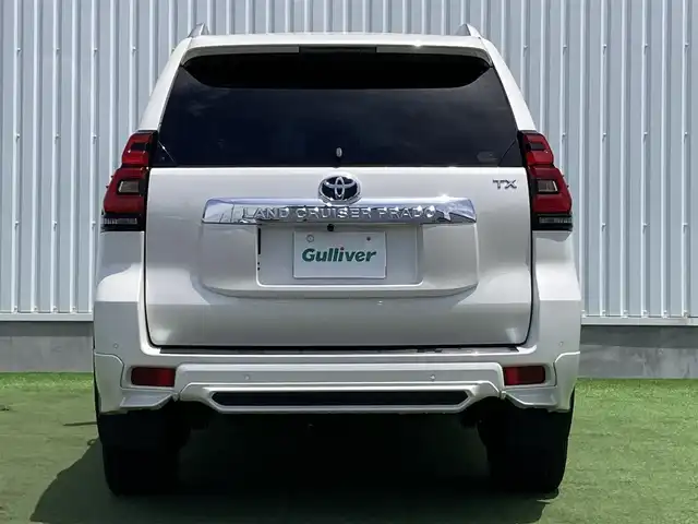 トヨタ ランドクルーザー プラド TX Lパッケージ 香川県 2019(令1)年 8万km ホワイトパールクリスタルシャイン 登録時走行距離：79972km/ディーラー純正9型ナビ/　CD DVD BT フルセグTV/バックカメラ/サンルーフ/TRDエアロ（フロント・リアアンダー）/オプション19インチアルミ/ブラックレザーシート/シートヒーター/エアシート/パワーシート/プリクラッシュセーフティシステム/レーンキープアシスト/レーダークルーズコントロール/ダウンヒルアシストコントロール/クリアランスソナー/ビルトインETC/ドライブレコーダー/MTモード付AT/横滑り防止装置/4WD/ディーゼルターボ/LEDヘッドライト/オートライト/フォグランプ/木目革巻きコンビステアリング/ステアリングスイッチ/プッシュスタート/スマートキー/スペアキー