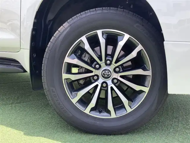 トヨタ ランドクルーザー プラド TX Lパッケージ 香川県 2019(令1)年 8万km ホワイトパールクリスタルシャイン 登録時走行距離：79972km/ディーラー純正9型ナビ/　CD DVD BT フルセグTV/バックカメラ/サンルーフ/TRDエアロ（フロント・リアアンダー）/オプション19インチアルミ/ブラックレザーシート/シートヒーター/エアシート/パワーシート/プリクラッシュセーフティシステム/レーンキープアシスト/レーダークルーズコントロール/ダウンヒルアシストコントロール/クリアランスソナー/ビルトインETC/ドライブレコーダー/MTモード付AT/横滑り防止装置/4WD/ディーゼルターボ/LEDヘッドライト/オートライト/フォグランプ/木目革巻きコンビステアリング/ステアリングスイッチ/プッシュスタート/スマートキー/スペアキー