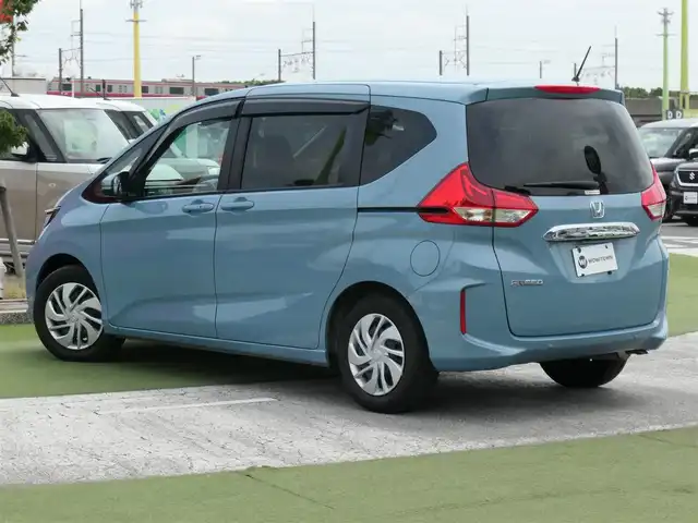 ホンダ フリード G ホンダセンシング 千葉県 2022(令4)年 1.8万km シーグラスブルーパール ホンダセンシング/・衝突軽減ブレーキ（CMBS）/・車線維持支援システム（LKAS）/・アダプティブクルーズコントロール（ACC）/・オートハイビーム/・先行車発進お知らせ機能/両側パワースライドドア/純正メモリーナビ/地デジTV/【DVD/CD再生可　Bluetooth接続】/バックカメラ/ドライブレコーダー（前後撮影）/前席シートヒーター/ステアリングスイッチ/ETC/LEDヘッドライト/ウインカーミラー/Hondaスマートキー