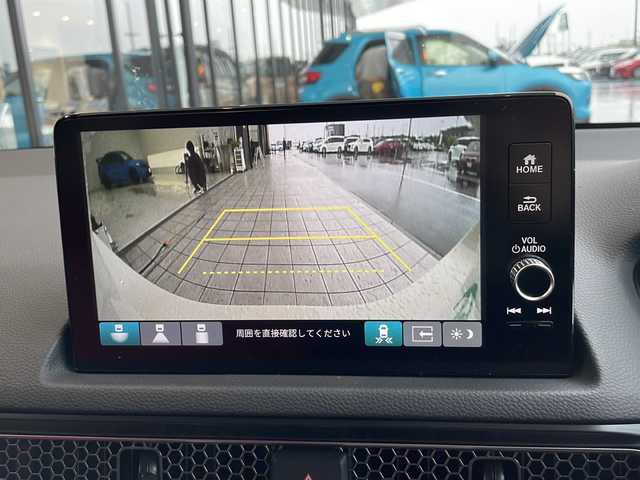 ホンダ シビック タイプR 愛知県 2025(令7)年 0.1万km未満 チャンピオンシップホワイト 登録済未使用車/衝突軽減システム/純正9型ディズプレイオーディオ　ナビあり/レーダークルーズコントロール/フルセグ/Bluetooth/バックカメラ/コーナーセンサー/純正アルミホイール/キャリパー/ETC2.0/ブラインドスポットモニター/LEDヘッドライト/オートマチックハイビーム/ステアリングスイッチ/スマートキー/プッシュスタート