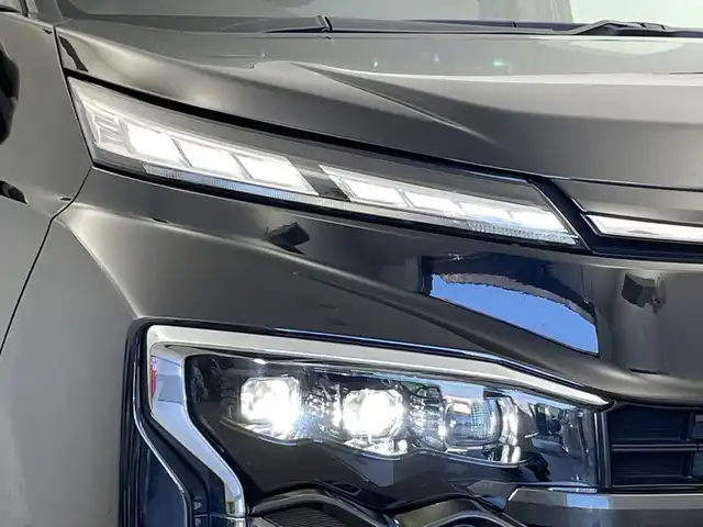 トヨタ ヴォクシー ハイブリッド S－Z 新潟県 2022(令4)年 4.1万km アティチュードブラックマイカ 純正10.5インチメモリナビ（Bluetooth・CD・DVD・USB）/両側パワースライドドア　/バックカメラ　/フルセグ　/ハーフレザーシート　/前席シートヒーター　/純正ビルトインETC2.0　/レーンキープアシスト　/追従クルーズコントロール/前後コーナーセンサー　/LEDオートライト/オートマチックハイビーム/衝突被害軽減システム/前後ドライブレコーダー/４WD/１００V充電/アイドリングストップ/革巻きステアリング/ステアリングリモコン/電子パーキングホールド/ドライブEVモード/純正フロアマット/純正１６インチアルミホイール/スマートキー
