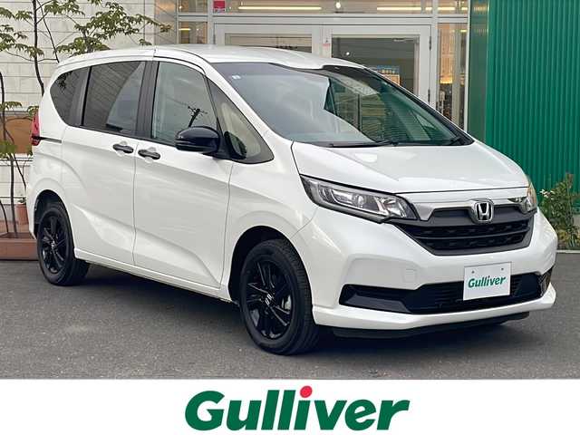 ホンダ フリード G ブラックスタイル 青森県 2024(令6)年 1.8万km プラチナホワイトパール 4WD/社外メモリナビ・ワンセグTV/CD・DVD・Bluetooth・・USB/バックカメラ/両側パワースライドドア/前席シートヒーター/ホンダセンシング/衝突軽減ブレーキ/追従クルーズコントロール/レーンキープアシスト/ビルトインETC/前方ドライブレコーダー/ワイパーデアイサー/LEDヘッドライト/オートライト/純正15インチアルミ