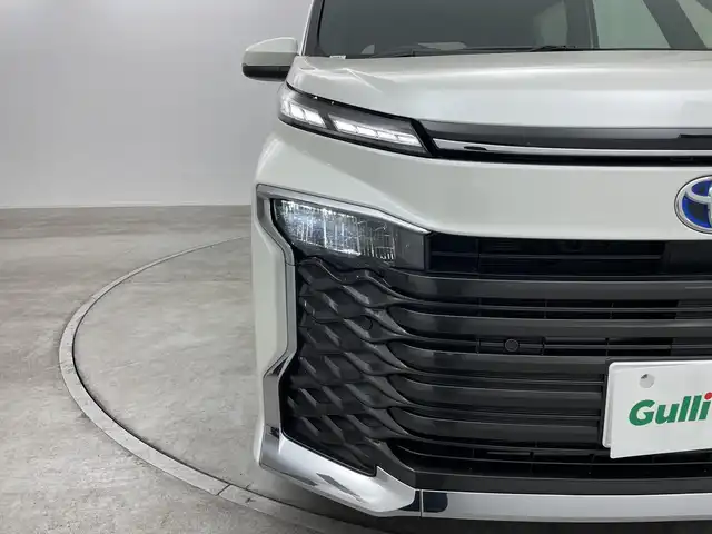 トヨタ ヴォクシー ハイブリッド S－G 群馬県 2025(令7)年 0.7万km ホワイトパールクリスタルシャイン 純正１０．５型ナビ　バックカメラ　衝突被害軽減ブレーキ　アダプティブクルーズコントロール　両側電動スライドドア　ビルトインETC ハーフレザーシート　オートハイビーム　純正ビルトインETC2.0 禁煙