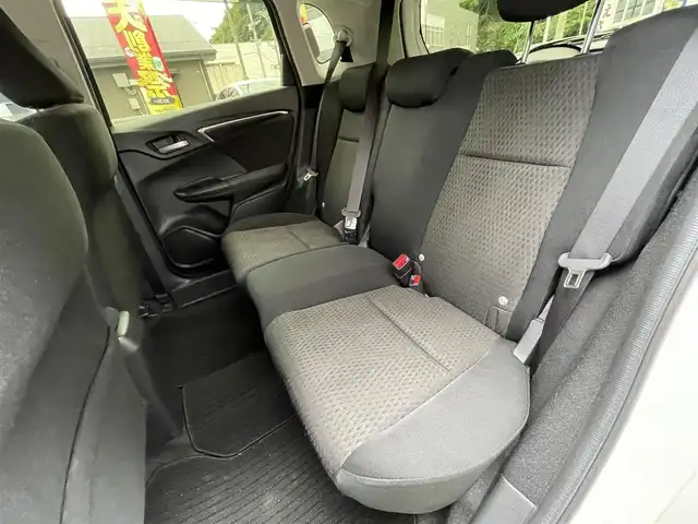 ホンダ フィット ハイブリット Fコンフォートエディション 長崎県 2019(令1)年 10.3万km プラチナホワイトパール 登録時102565km/純正ナビ/・TV/・Bluetooth/・DVD/ビルトインETC/バックカメラ/シートヒーター/レーダークルーズコントロール/ドライブレコーダー/電動格納ミラー/ドアバイザー