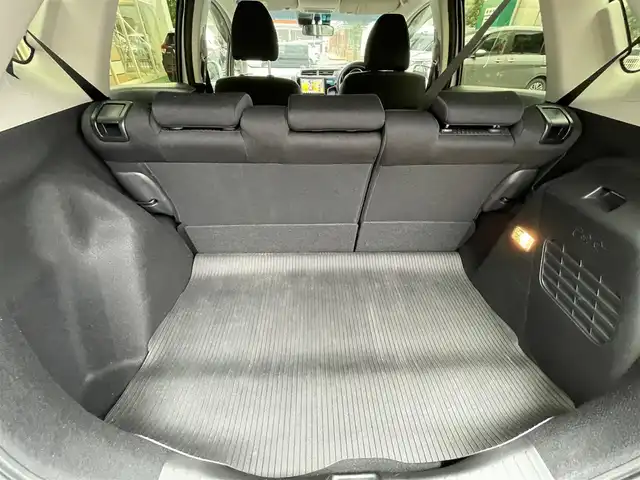 ホンダ フィット ハイブリット Fコンフォートエディション 長崎県 2019(令1)年 10.3万km プラチナホワイトパール 登録時102565km/純正ナビ/・TV/・Bluetooth/・DVD/ビルトインETC/バックカメラ/シートヒーター/レーダークルーズコントロール/ドライブレコーダー/電動格納ミラー/ドアバイザー