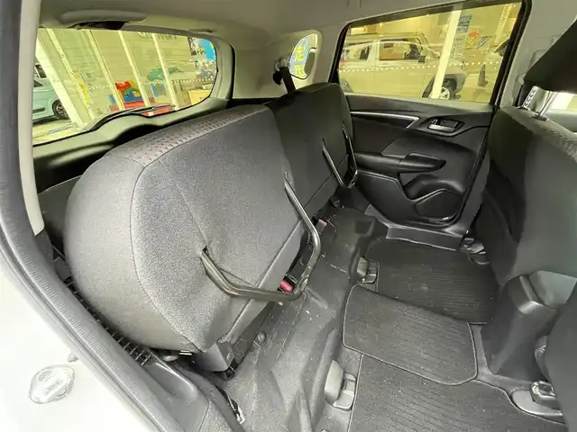 ホンダ フィット ハイブリット Fコンフォートエディション 長崎県 2019(令1)年 10.3万km プラチナホワイトパール 登録時102565km/純正ナビ/・TV/・Bluetooth/・DVD/ビルトインETC/バックカメラ/シートヒーター/レーダークルーズコントロール/ドライブレコーダー/電動格納ミラー/ドアバイザー