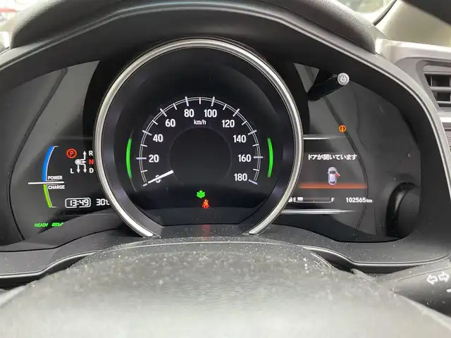 ホンダ フィット ハイブリット Fコンフォートエディション 長崎県 2019(令1)年 10.3万km プラチナホワイトパール 登録時102565km/純正ナビ/・TV/・Bluetooth/・DVD/ビルトインETC/バックカメラ/シートヒーター/レーダークルーズコントロール/ドライブレコーダー/電動格納ミラー/ドアバイザー