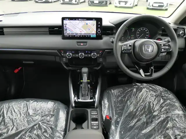 ホンダ ヴェゼル ハイブリッド e:HEV Z 千葉県 2025(令7)年 0.1千km クリスタルブラックパール e:HEV Z　4VC4AZ　Honda CONNECTディスプレー+ETC2.0車載器+ワイヤレス充電器(231000)/ホンダセンシング/・衝突軽減ブレーキ（CMBS）/・車線維持支援システム（LKAS）/・アダプティブクルーズコントロール（ACC）/・ブラインドスポットインフォメーション/・後方誤発進抑制機能/・誤発進抑制機能/パワーバックドア/ハーフレザーシート/前席シートヒーター/純正コネクトナビ/地デジTV/【Bluetooth接続】/【Apple CarPlay　Android Auto対応】/バックカメラ/ワイヤレス充電/革巻きステアリング/ステアリングスイッチ/パドルシフト/ETC（2.0）/LEDヘッドライト/フォグライト/ウインカーミラー/コーナーセンサー/純正18インチアルミホイル/サイド/カーテンエアバッグ/Honda スマートキー