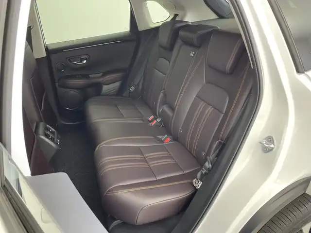 ホンダ ＺＲ－Ｖ ハイブリッド e:HEV Z 新潟県 2023(令5)年 1.9万km プラチナホワイトパール 純正ホンダコネクトディスプレイナビ/（BT/FM/AM/フルセグTV)/全周囲カメラ/ステアリングスイッチ/ステアリングヒーター/パドルシフト/置くだけ充電/D/Nパワーシート/レザーシート/シートヒーター/シートメモリー/ブラインドスポットモニター/ETC/取扱説明書/保証書/整備記録簿