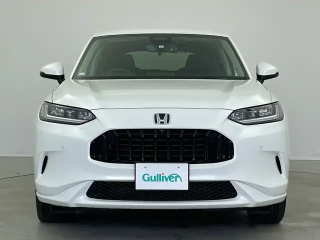 ホンダ ＺＲ－Ｖ ハイブリッド e:HEV Z 新潟県 2023(令5)年 1.9万km プラチナホワイトパール 純正ホンダコネクトディスプレイナビ/（BT/FM/AM/フルセグTV)/全周囲カメラ/ステアリングスイッチ/ステアリングヒーター/パドルシフト/置くだけ充電/D/Nパワーシート/レザーシート/シートヒーター/シートメモリー/ブラインドスポットモニター/ETC/取扱説明書/保証書/整備記録簿